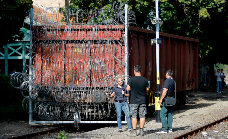 Image: Razor-wire-covered train car in Roszke, Hungary