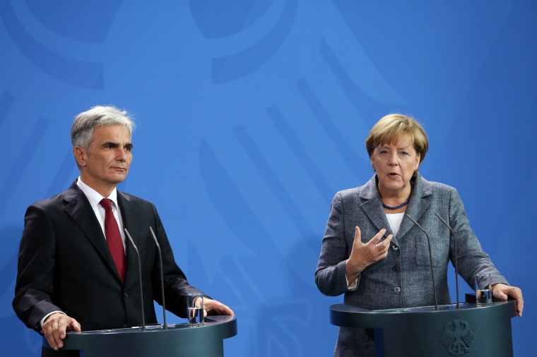 Image: Merkel And Feymann Discuss Migrants Crisis