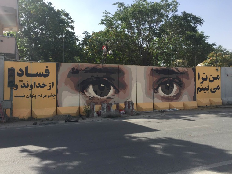 Image: An Afghan artist's warning to corrupt politicians: "I see you"