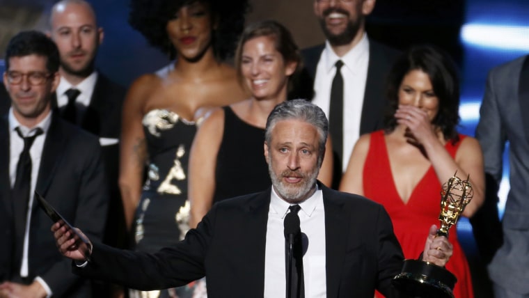 Image: Jon Stewart accepts the award for Outstanding Variety Talk Series for Comedy Central's "The Daily Show with Jon Stewart" at the 67th Primetime Emmy Awards in Los Angeles
