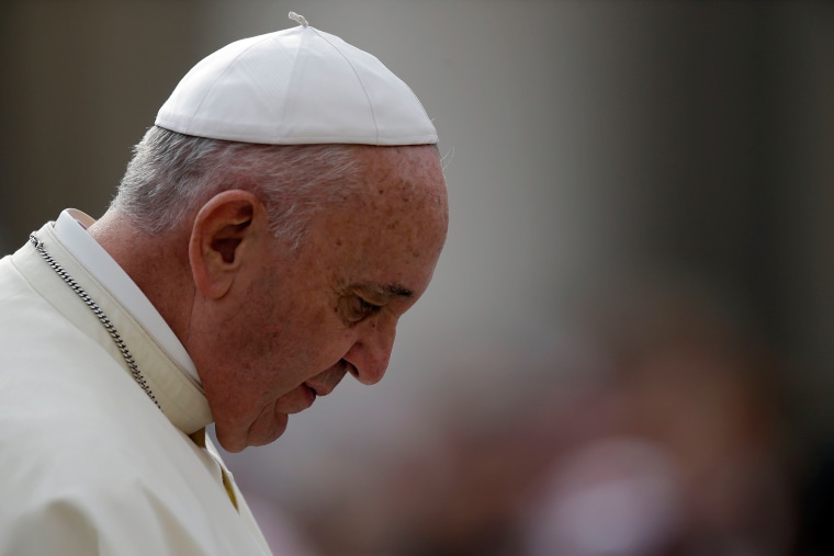 Image: Pope Francis with head bowed