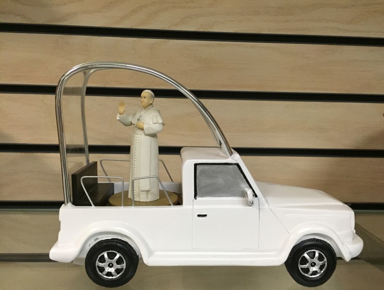 This is on sale at the gift shop of the Basilica of the national shrine of the immaculate conception, where the canonization mass was held today. It retails for 99. 95. 
The catalog description says it "recreates the papal ride through DC, and plays the Hallelujah chorus from Handel's Messiah as Pope Francis spins to greet all who have come to see him."