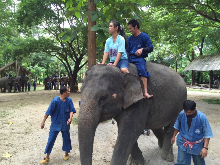 Image: Natthanan Sukon riding an elephant