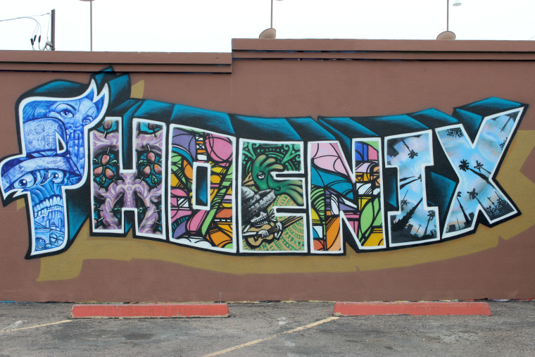 Mural behind Barrio Cafe in Phoenix was created as part of the Calle 16 mural project.