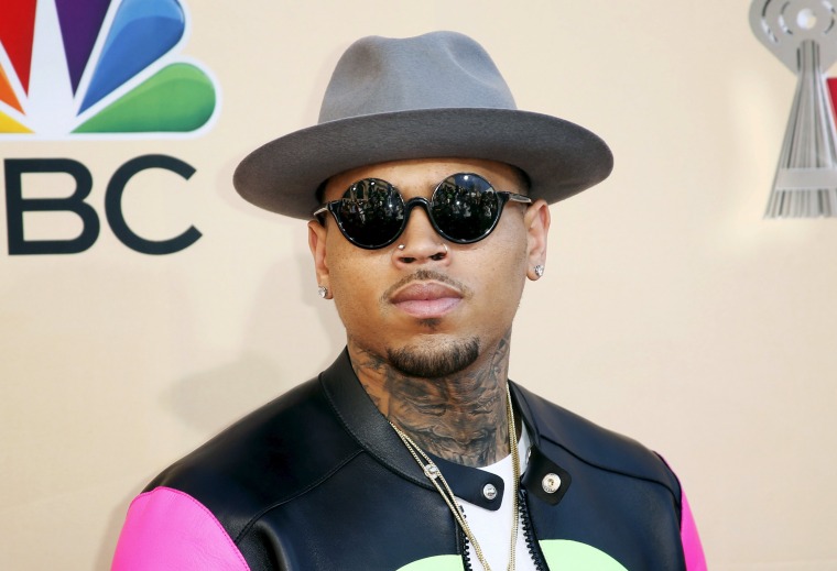 Image: File picture of R&amp;B singer Chris Brown posing at the 2015 iHeartRadio Music Awards in Los Angeles, California