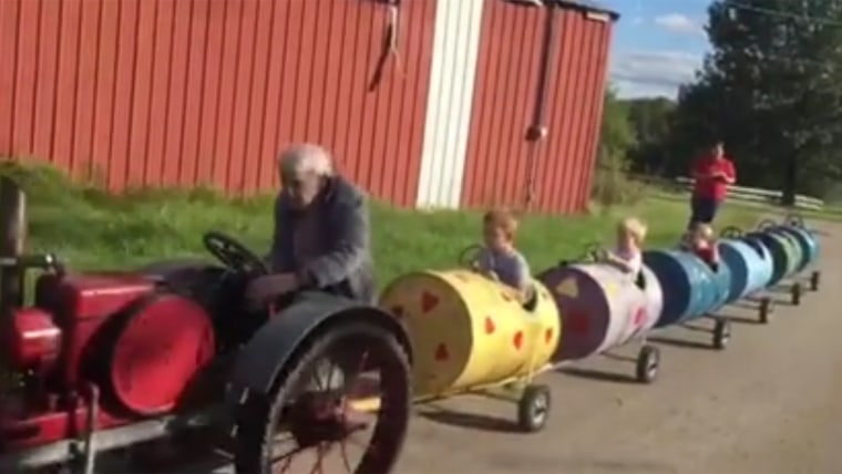 Alvin Bogie takes his great-grandsons on a train ride.