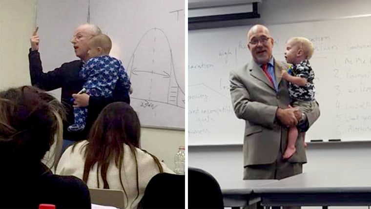 Professors hold toddlers.