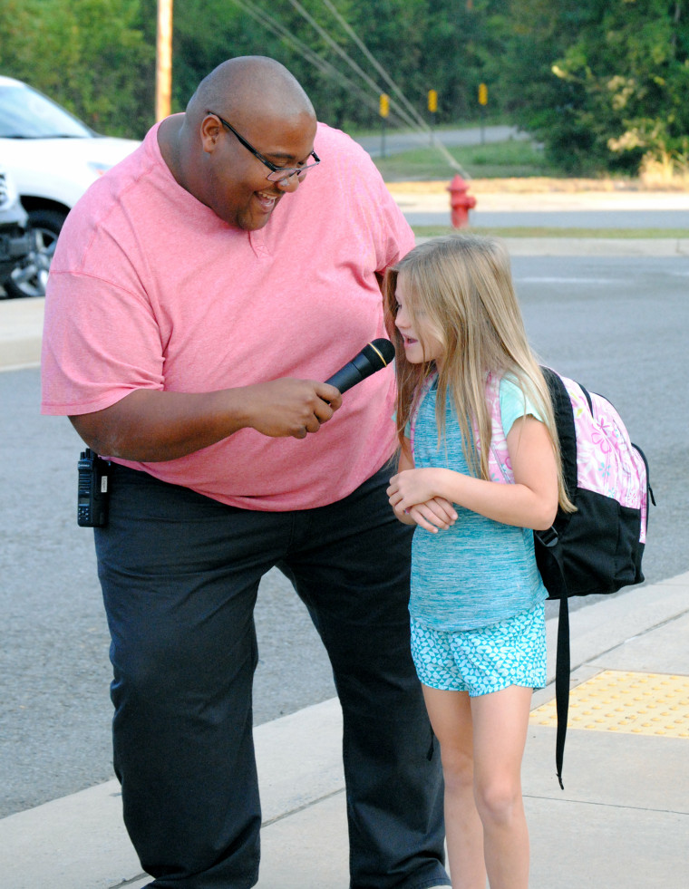 Principal welcomes students back with dancing