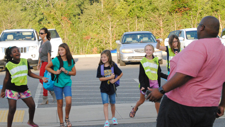 Principal welcomes students back with dancing