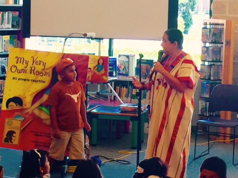 Author Amada Irma Perez fields a question from a young boy during her reading at the Tomás Rivera Award Literature Fair in San Marcos, Texas on Saturday.