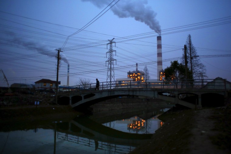Image: Smoke rises from chimneys of a thermal power plant in Shanghai