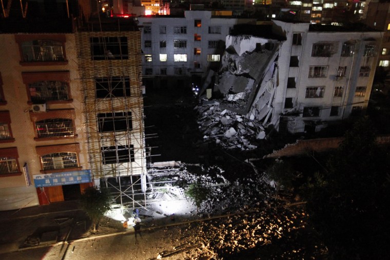 Image: Site of a series of blasts at a damaged building