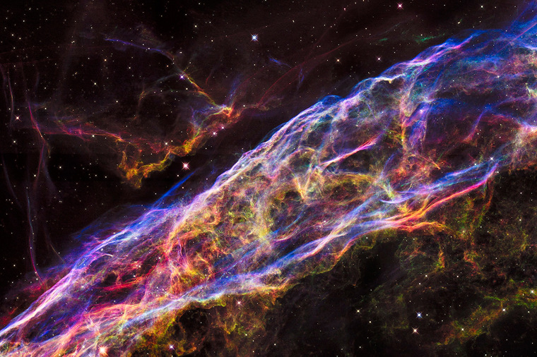 Image: A small section of the expanding remains of the Veil Nebula is seen in an image from NASA's Hubble Space Telescope