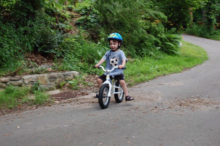 Photo: Max Kaufman, then 2-years-old, enjoys a spin on his balance bike in New York.