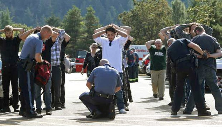Image: Students searched after shooting on college campus