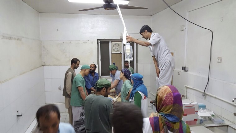 Image: Afghan (MSF) surgeons work inside a Medecins Sans Frontieres (MSF) hospital