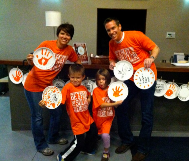 The Dannemiller family volunteering at Second Harvest, a local food bank.