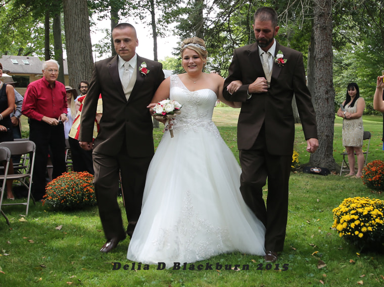 Father and stepfather shared duties walking Brittany Peck down the aisle at her wedding