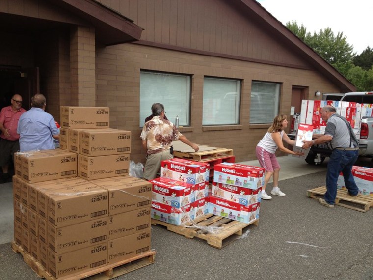 “Diaper Delivery Day” is always a welcome event at diaper banks. Volunteers at the Tri-Cities Diaper Bank in Yakima, Wash., unload pallets of diapers that will be repackaged and distributed to families in need.