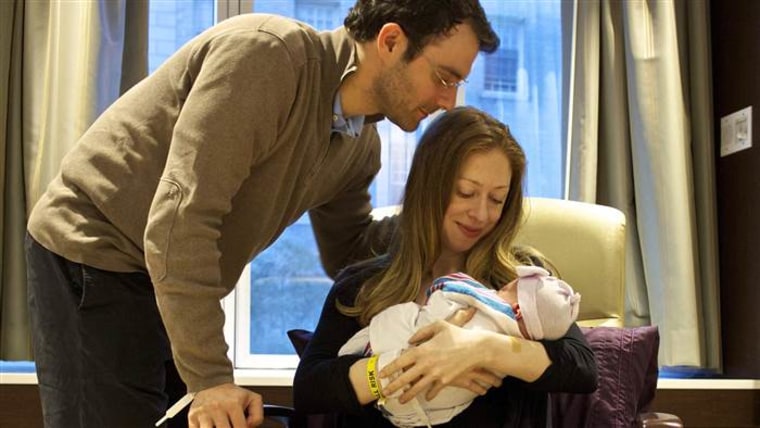 Chelsea Clinton, husband Marc Mezvinsky, and baby Charlotte.