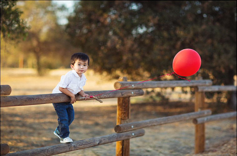 "All you need is one great color pop -- a red scarf, pink umbrella, yellow balloon -- to bring excitement and life back into the scene," says Wilkerson.