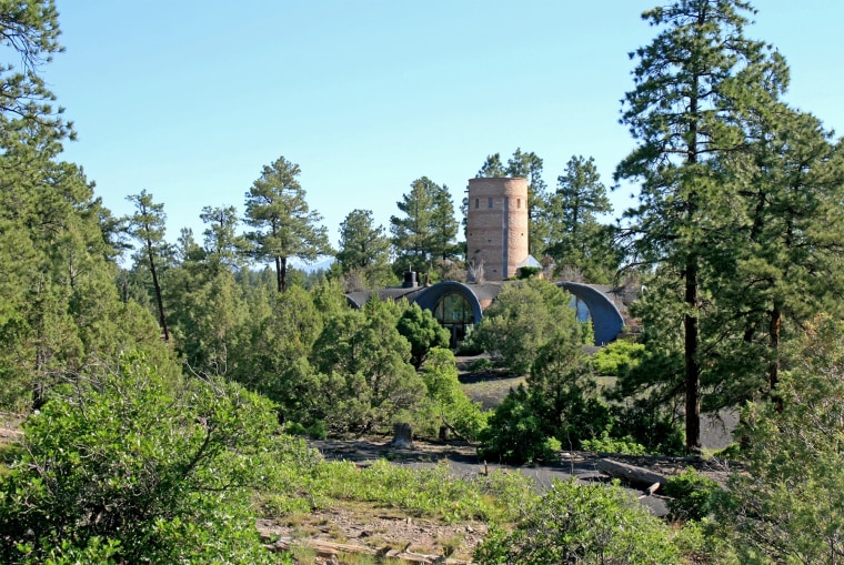 An asterisk-shaped home with an Anasazi-style tower