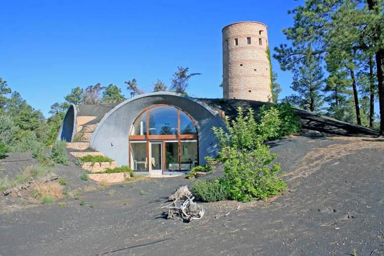 An asterisk-shaped home with an Anasazi-style tower