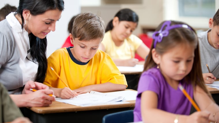 Image: Elementary school students at desk