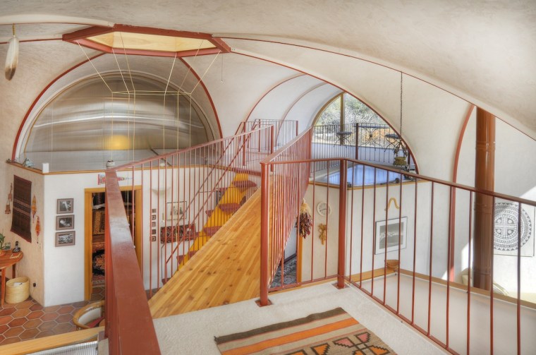 An asterisk-shaped home with an Anasazi-style tower