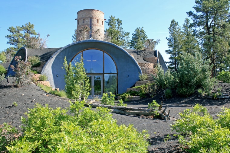 An asterisk-shaped home with an Anasazi-style tower