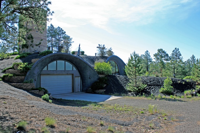 An asterisk-shaped home with an Anasazi-style tower