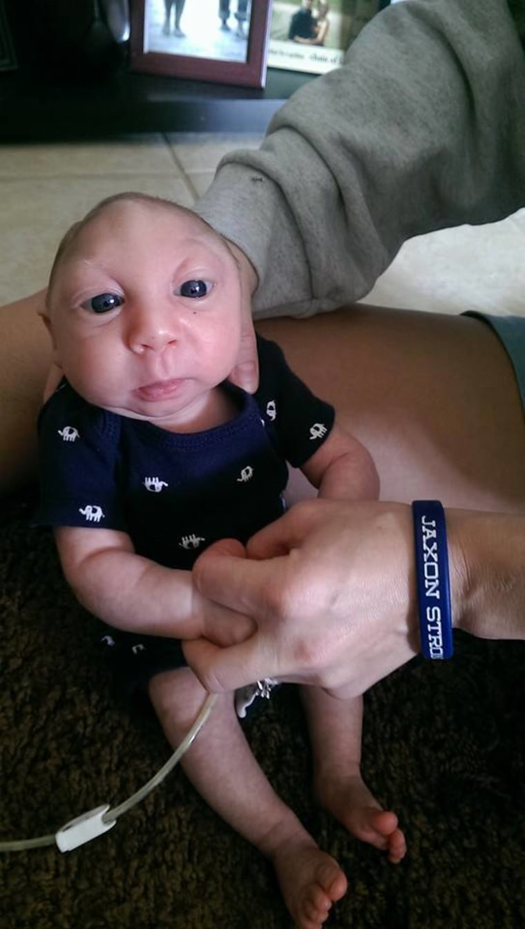 Jaxon is a happy, smiling, affectionate baby, his father says.