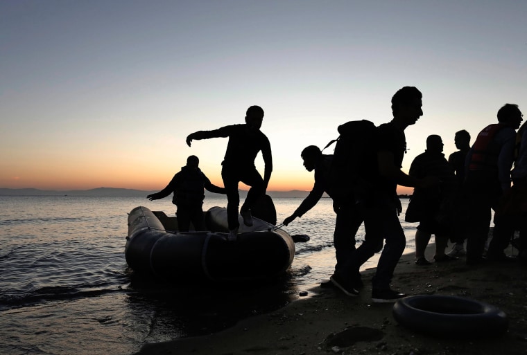 Image: Refugees arrive on the island of Kos