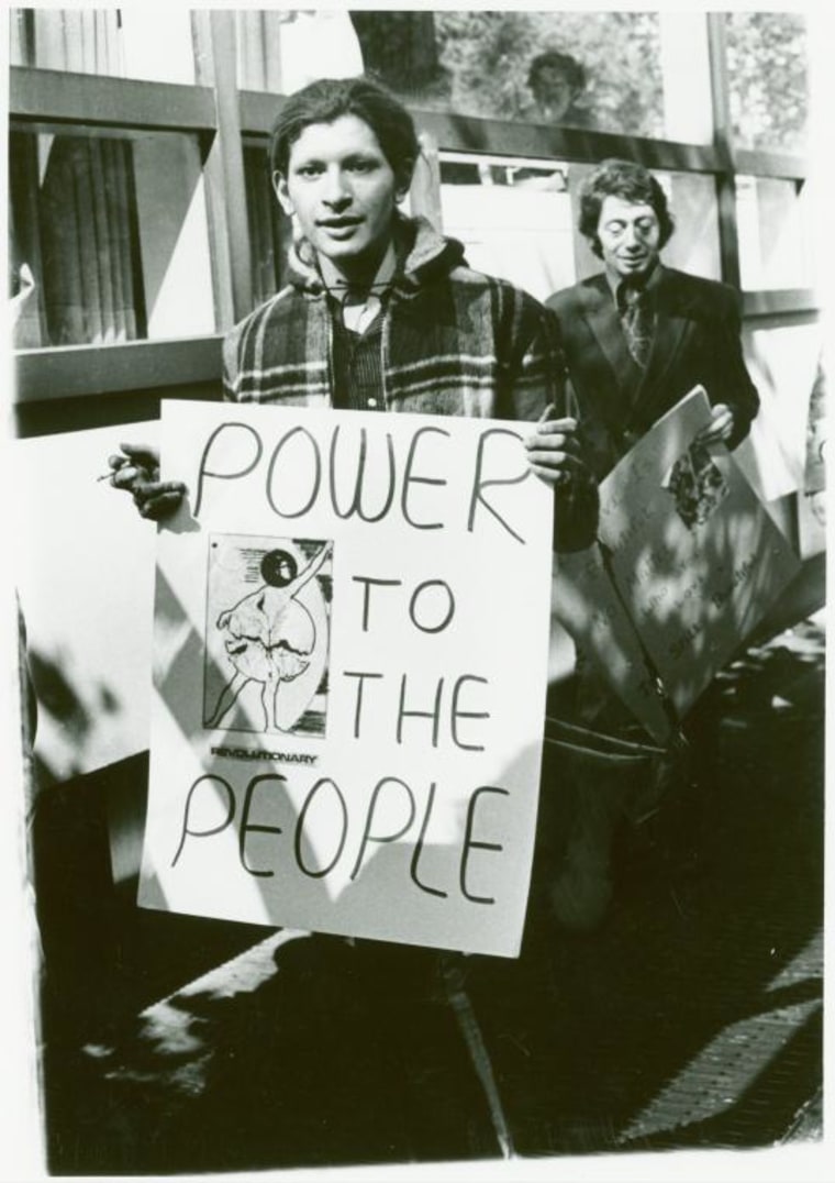 Sylvia Ray Rivera (front) and Arthur Bell at gay liberation demonstration, New York University, 1970.