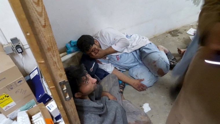 Image: Afghan staff react inside an MSF hospital in Kunduz