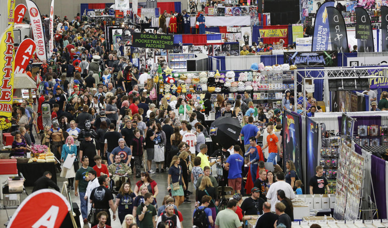 IMAGE: Numerous attendees walk through Salt Lake Comic Con 2015