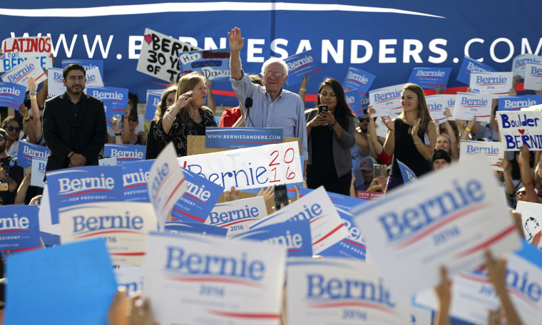 Image: Democratic presidential candidate Bernie Sanders speaks to a crowd against a Rocky Mountain backdrop at the University of Colorado in Boulder