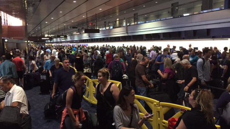 IMAGE: Delayed passengers at the Las Vegas airport