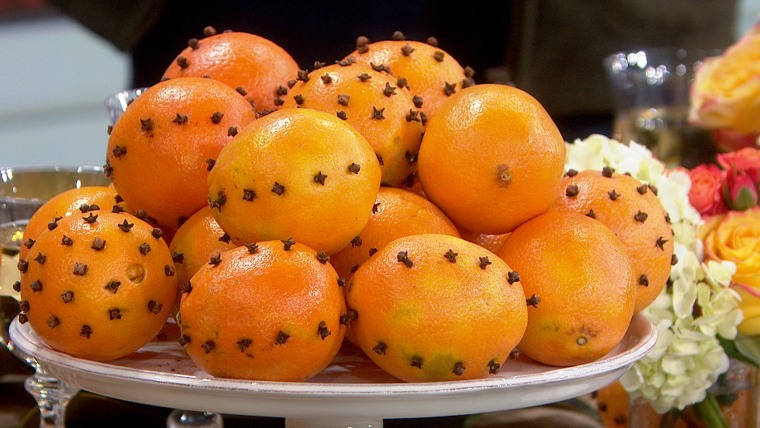 Fall decorating clove oranges holiday table Thanksgiving