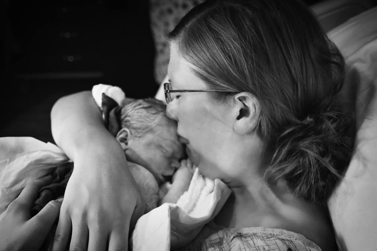 Natalie Morgan shares a tender kiss with daughter Eleanor Josephine.