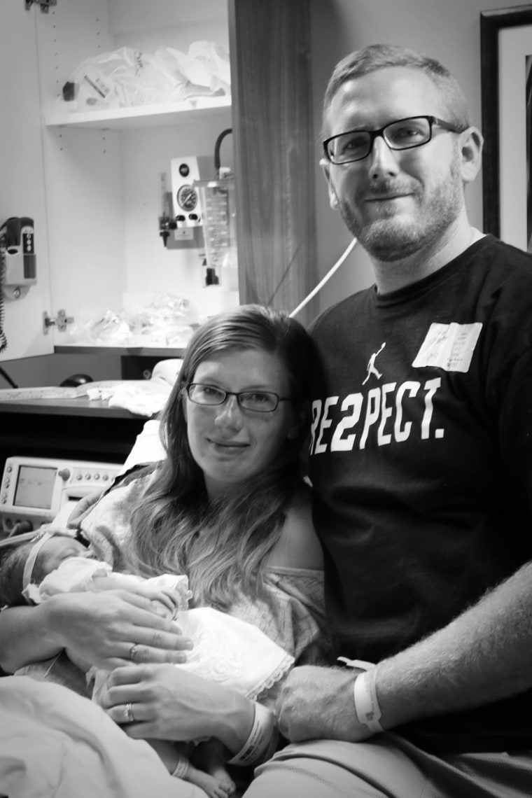 Natalie and husband, Brian, with baby Eleanor.