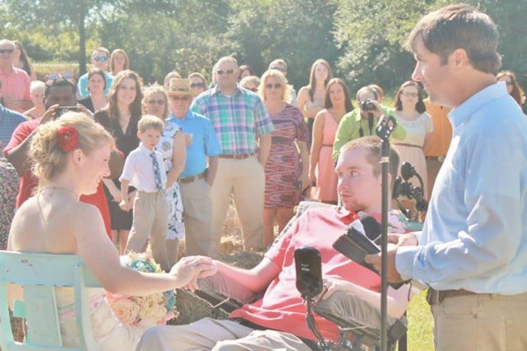 Image: Joel and Lauren Jackson on their wedding day in 2013.