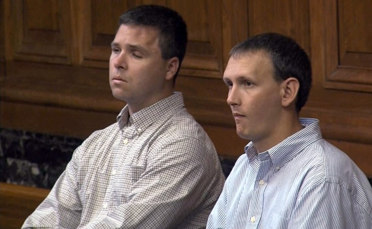 Milwaukee police officer Bryan Norberg, right, and Officer Graham Kunisch in a Milwaukee courtroom testifying against Badger Gun Store where a illegally purchased gun was used to  shoot both officers during an arrest.