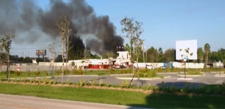 Image: Smoke from the scene of the crash