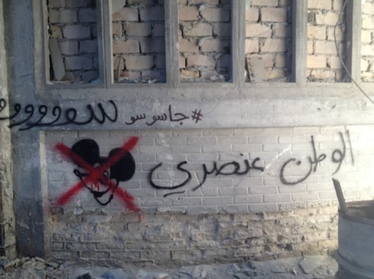 "Homeland is Racist" painted in Arabic on the set of the show. (Courtesy of the artists)