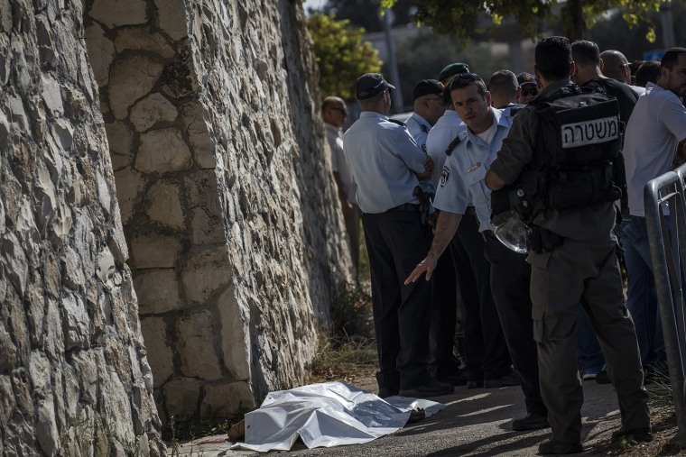 Image: Body of Palestinian man at site of a stabbing in Jerusalem on Saturday