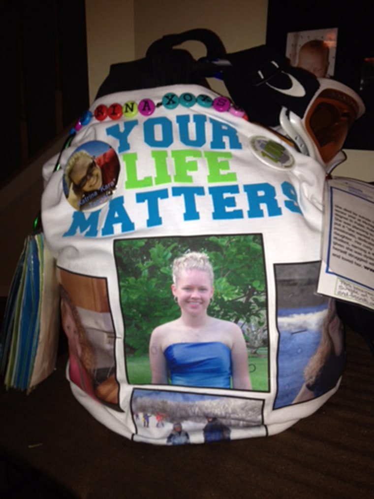 Image: A backpack in memory of Kara Tagget is part of an exhibit called Send Silence Packing