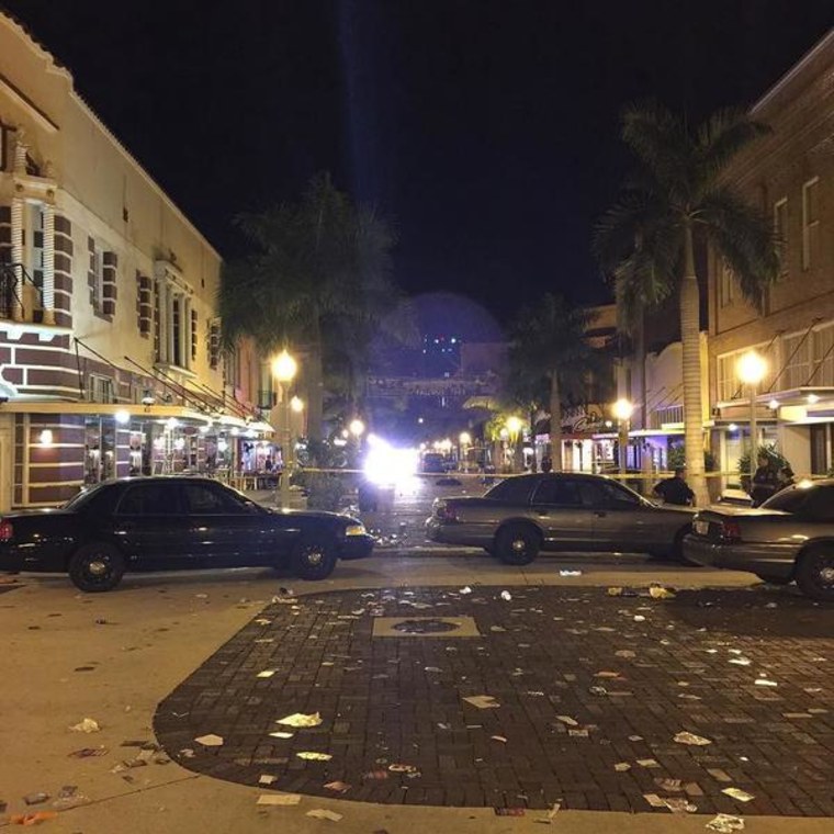 Image: Police patrol cars stand in Fort Myers