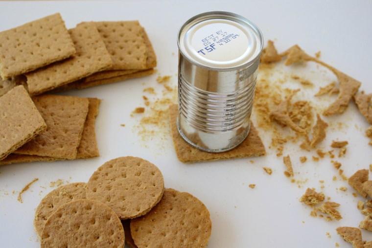 Graham crackers being cut for S'mores Bites recipe