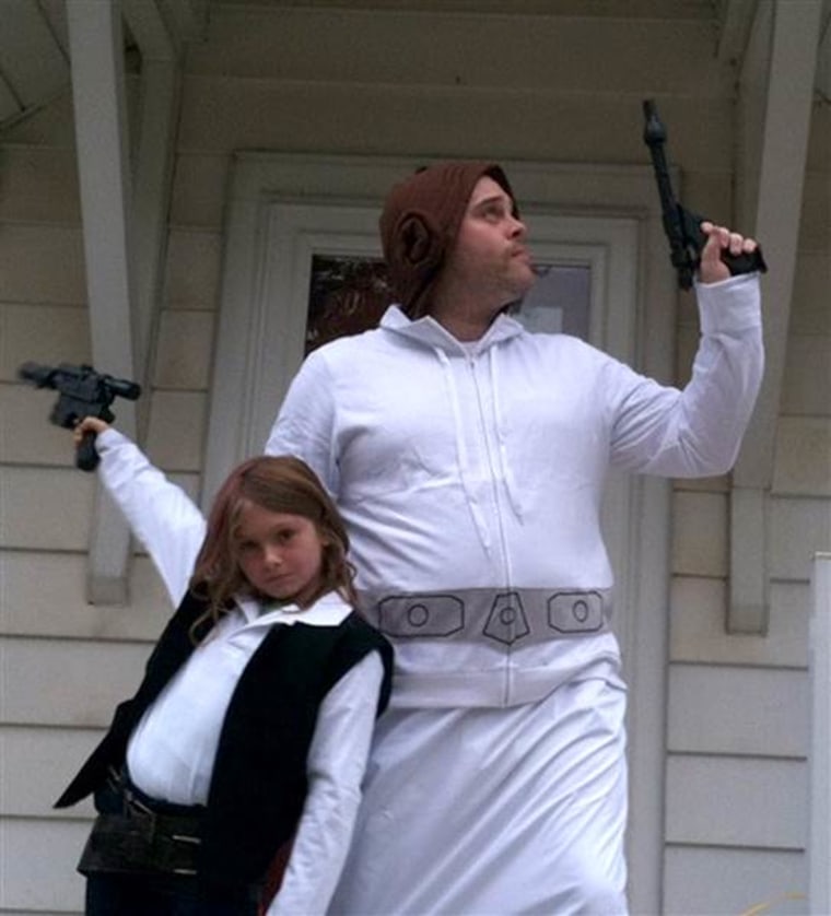 Tom Burns dressed as Princess Leia to complement his daughter's Han Solo costume.